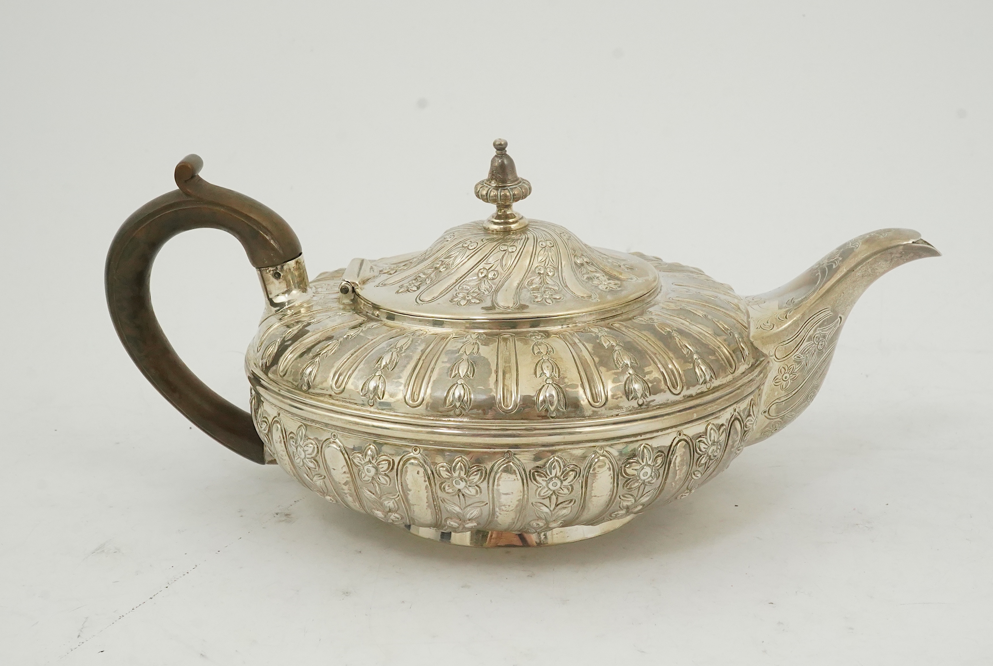 A William IV embossed silver teapot, by Joseph & John Angell